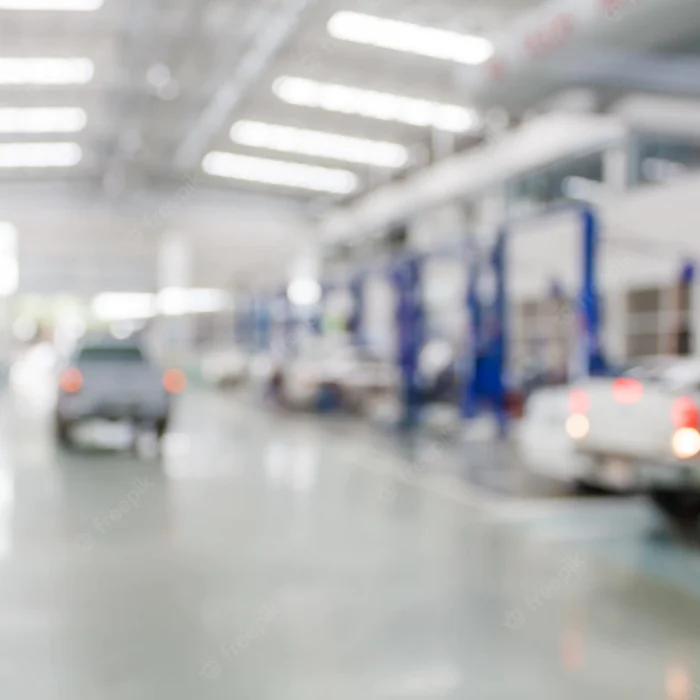 car-service-centre-auto-repair-workshop-blurred-background_293060-5776